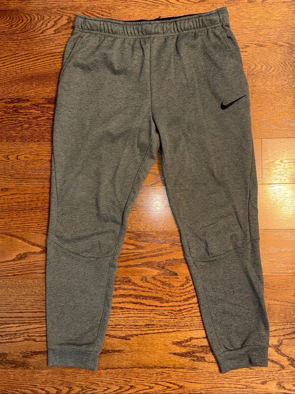 Size L men’s gray Nike dri-fit sweatpants.